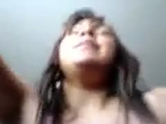 On top of me is a sexy, breasty Mexican honey with an unshaven slit.